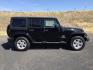 2013 Black /Black Jeep Wrangler Unlimited Sahara (1C4BJWEGXDL) with an 3.6L V-6 DOHC engine, 5-Speed Automatic transmission, located at 1801 Main Street, Lewiston, 83501, (208) 743-9371, 46.417065, -117.004799- Photo#6