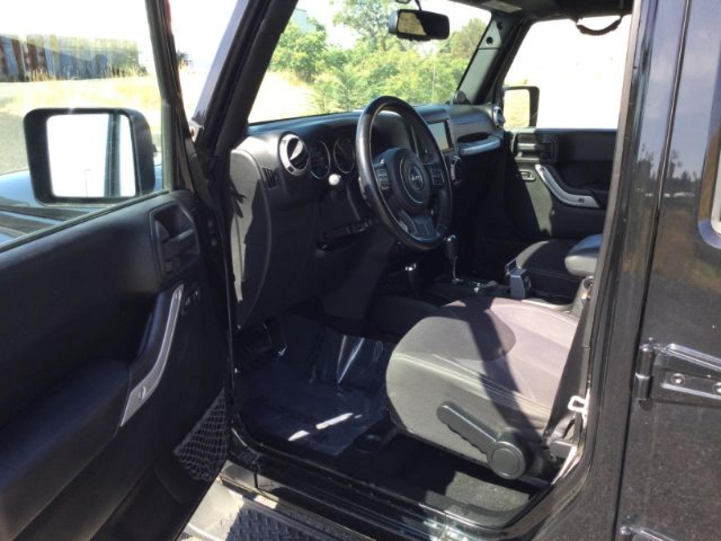 2013 Black /Black Jeep Wrangler Unlimited Sahara (1C4BJWEGXDL) with an 3.6L V-6 DOHC engine, 5-Speed Automatic transmission, located at 1801 Main Street, Lewiston, 83501, (208) 743-9371, 46.417065, -117.004799- Photo#10