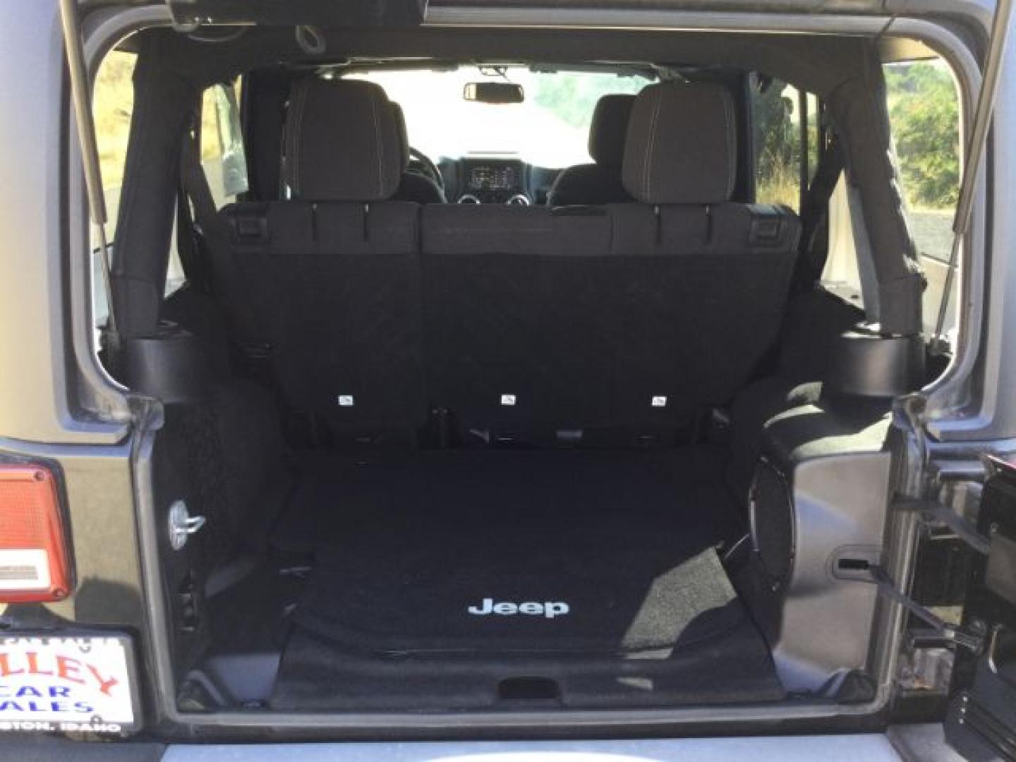 2013 Black /Black Jeep Wrangler Unlimited Sahara (1C4BJWEGXDL) with an 3.6L V-6 DOHC engine, 5-Speed Automatic transmission, located at 1801 Main Street, Lewiston, 83501, (208) 743-9371, 46.417065, -117.004799- Photo#11