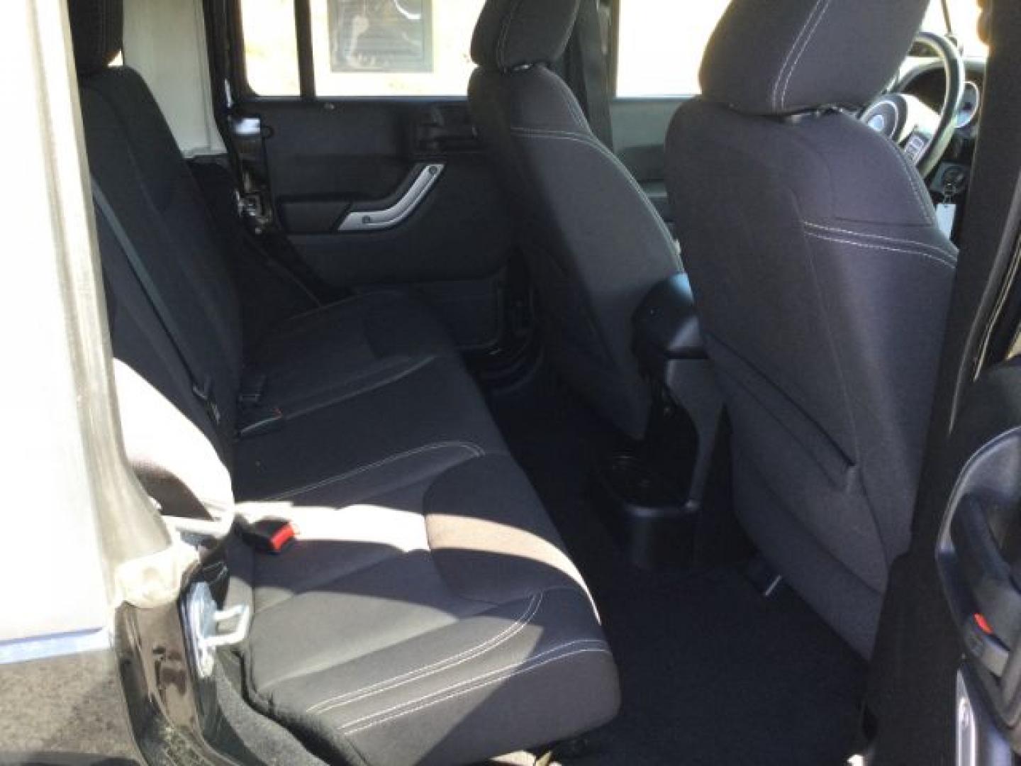 2013 Black /Black Jeep Wrangler Unlimited Sahara (1C4BJWEGXDL) with an 3.6L V-6 DOHC engine, 5-Speed Automatic transmission, located at 1801 Main Street, Lewiston, 83501, (208) 743-9371, 46.417065, -117.004799- Photo#12