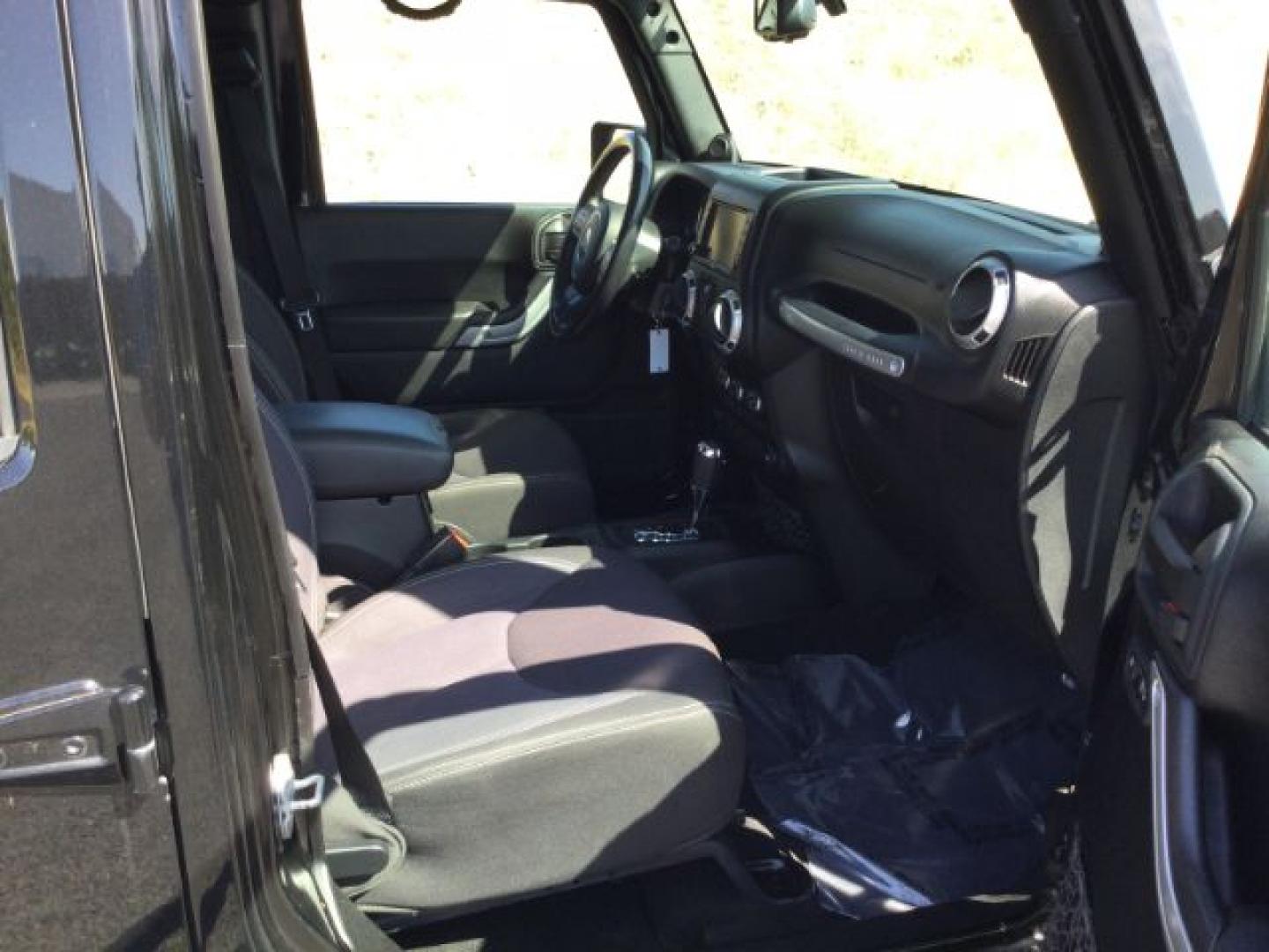 2013 Black /Black Jeep Wrangler Unlimited Sahara (1C4BJWEGXDL) with an 3.6L V-6 DOHC engine, 5-Speed Automatic transmission, located at 1801 Main Street, Lewiston, 83501, (208) 743-9371, 46.417065, -117.004799- Photo#13