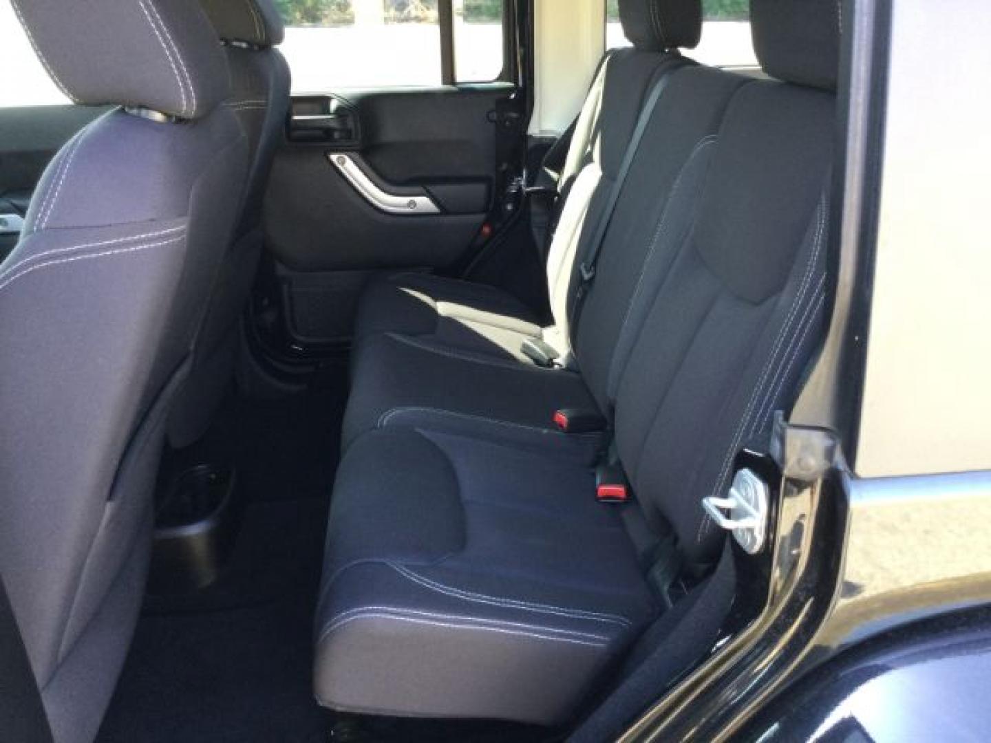 2013 Black /Black Jeep Wrangler Unlimited Sahara (1C4BJWEGXDL) with an 3.6L V-6 DOHC engine, 5-Speed Automatic transmission, located at 1801 Main Street, Lewiston, 83501, (208) 743-9371, 46.417065, -117.004799- Photo#15
