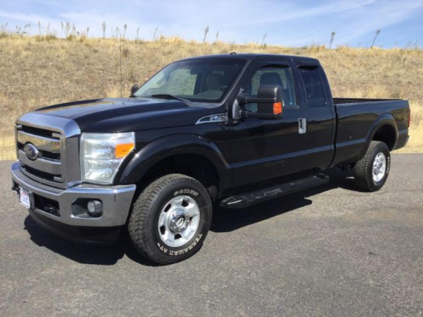 2011 Tuxedo Black Metallic /Adobe Cloth Ford F-250 Super Cab XLT 4x4 (1FT7X2B65BE) with an 6.2 EFI V8 engine, 6-Speed Automatic transmission, located at 1801 Main Street, Lewiston, 83501, (208) 743-9371, 46.417065, -117.004799- Photo#1