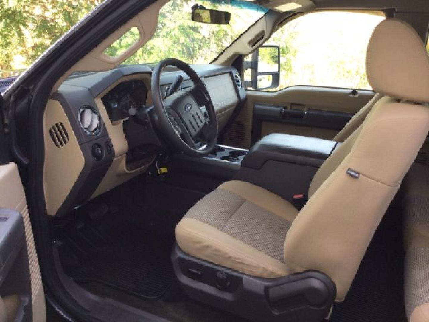 2011 Tuxedo Black Metallic /Adobe Cloth Ford F-250 Super Cab XLT 4x4 (1FT7X2B65BE) with an 6.2 EFI V8 engine, 6-Speed Automatic transmission, located at 1801 Main Street, Lewiston, 83501, (208) 743-9371, 46.417065, -117.004799- Photo#3