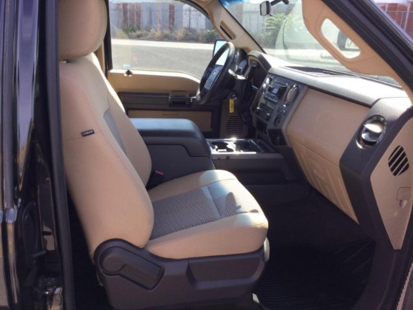 2011 Tuxedo Black Metallic /Adobe Cloth Ford F-250 Super Cab XLT 4x4 (1FT7X2B65BE) with an 6.2 EFI V8 engine, 6-Speed Automatic transmission, located at 1801 Main Street, Lewiston, 83501, (208) 743-9371, 46.417065, -117.004799- Photo#5