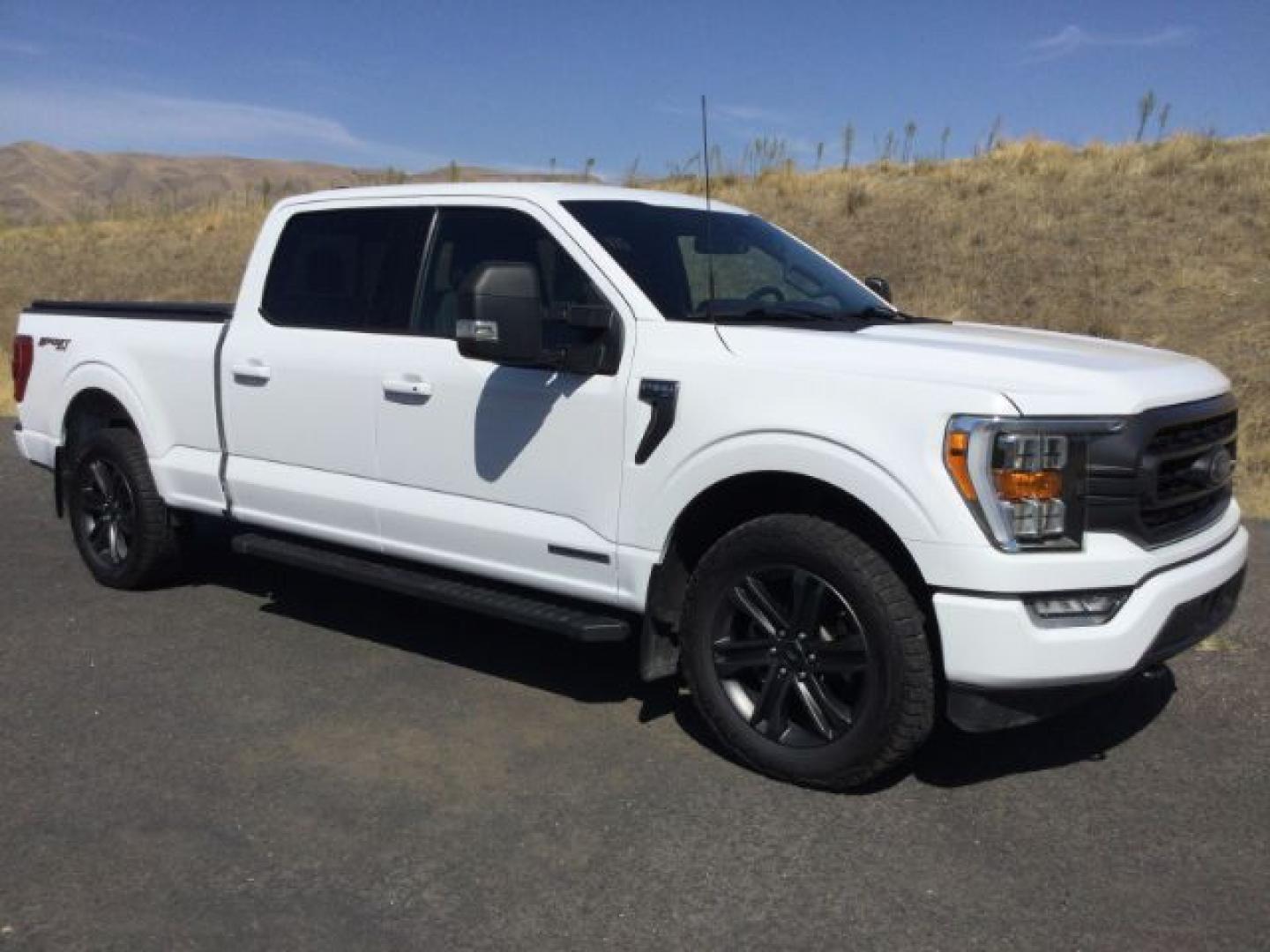 2021 Oxford White /Black/Medium Dark Slate Ford F-150 XLT/Sport (1FTFW1ED9MF) with an EcoBoost 3.5L V-6 port/direct injection engine, 10 speed automatic transmission, located at 1801 Main Street, Lewiston, 83501, (208) 743-9371, 46.417065, -117.004799- Photo#0