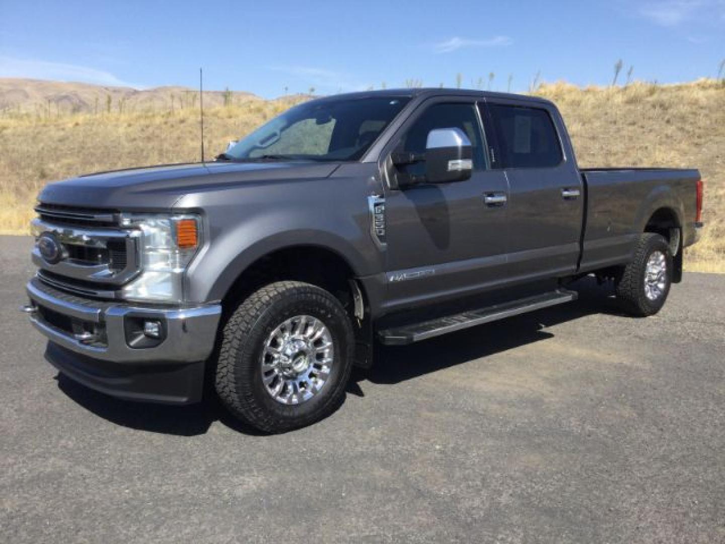 2022 Carbonized Gray Metallic /Medium Earth Gray Ford F-350 XLT Long Box (1FT8W3BT6NE) with an Powerstroke 6.7L V-8 direct injection engine, 10 speed automatic transmission, located at 1801 Main Street, Lewiston, 83501, (208) 743-9371, 46.417065, -117.004799- Photo#0