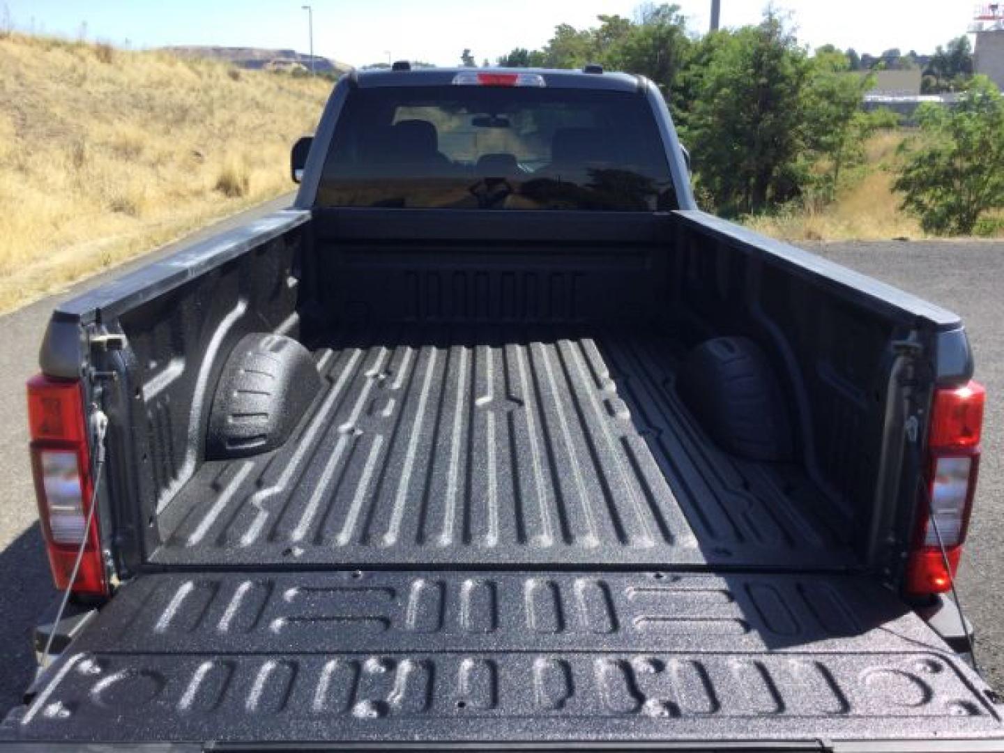 2022 Carbonized Gray Metallic /Medium Earth Gray Ford F-350 XLT Long Box (1FT8W3BT6NE) with an Powerstroke 6.7L V-8 direct injection engine, 10 speed automatic transmission, located at 1801 Main Street, Lewiston, 83501, (208) 743-9371, 46.417065, -117.004799- Photo#5