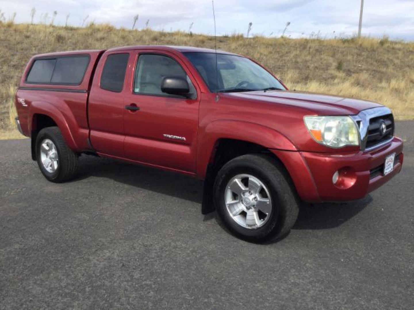 2006 Radiant Red /Graphite Toyota Tacoma Base V6 (5TEUU42N16Z) with an 4L V-6 DOHC engine, 5-Speed Automatic transmission, located at 1801 Main Street, Lewiston, 83501, (208) 743-9371, 46.417065, -117.004799- Photo#0
