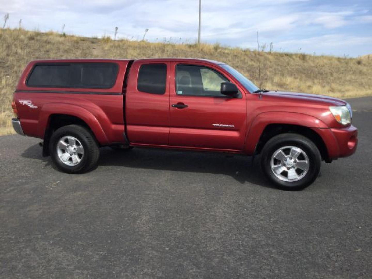2006 Radiant Red /Graphite Toyota Tacoma Base V6 (5TEUU42N16Z) with an 4L V-6 DOHC engine, 5-Speed Automatic transmission, located at 1801 Main Street, Lewiston, 83501, (208) 743-9371, 46.417065, -117.004799- Photo#1