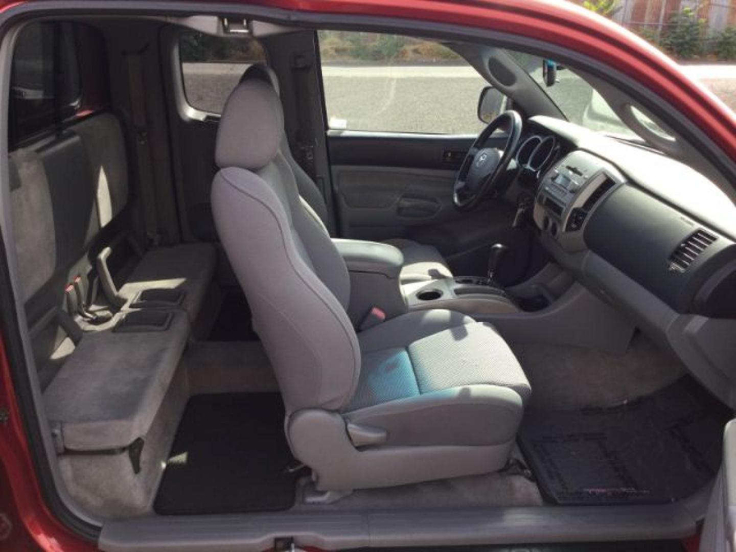 2006 Radiant Red /Graphite Toyota Tacoma Base V6 (5TEUU42N16Z) with an 4L V-6 DOHC engine, 5-Speed Automatic transmission, located at 1801 Main Street, Lewiston, 83501, (208) 743-9371, 46.417065, -117.004799- Photo#6