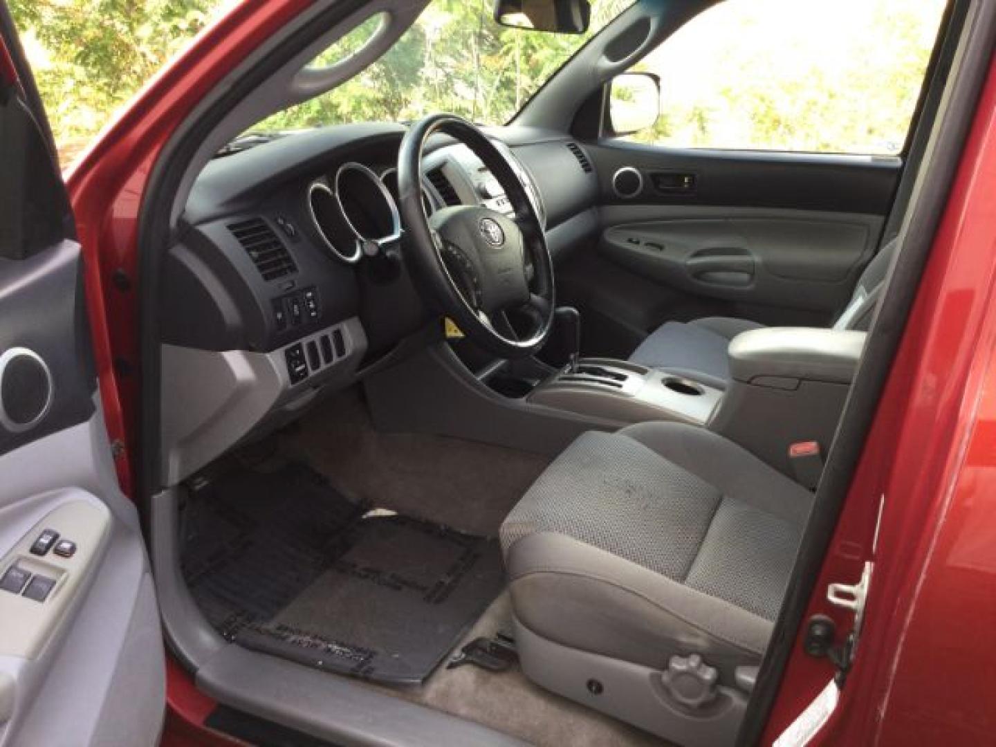 2006 Radiant Red /Graphite Toyota Tacoma Base V6 (5TEUU42N16Z) with an 4L V-6 DOHC engine, 5-Speed Automatic transmission, located at 1801 Main Street, Lewiston, 83501, (208) 743-9371, 46.417065, -117.004799- Photo#7