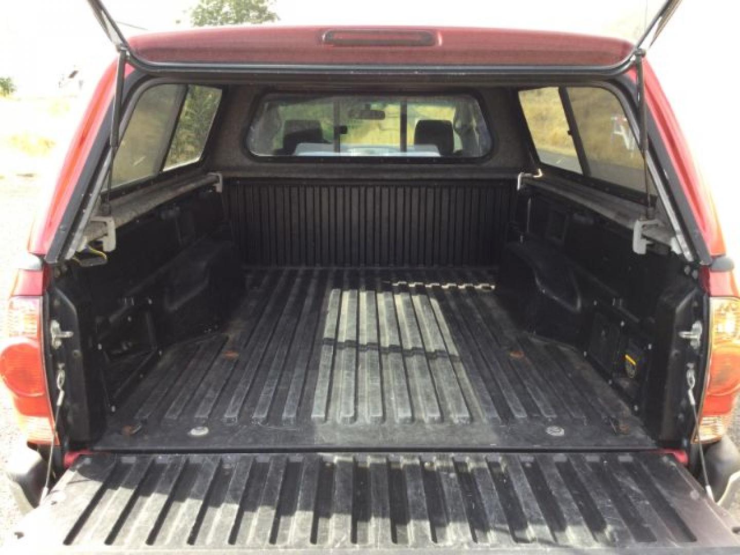 2006 Radiant Red /Graphite Toyota Tacoma Base V6 (5TEUU42N16Z) with an 4L V-6 DOHC engine, 5-Speed Automatic transmission, located at 1801 Main Street, Lewiston, 83501, (208) 743-9371, 46.417065, -117.004799- Photo#10