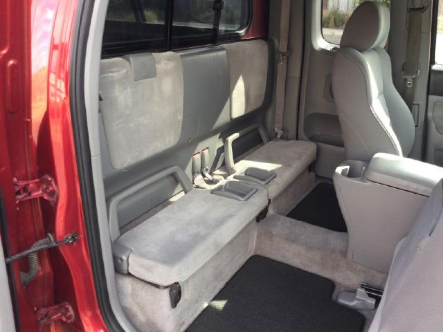 2006 Radiant Red /Graphite Toyota Tacoma Base V6 (5TEUU42N16Z) with an 4L V-6 DOHC engine, 5-Speed Automatic transmission, located at 1801 Main Street, Lewiston, 83501, (208) 743-9371, 46.417065, -117.004799- Photo#12