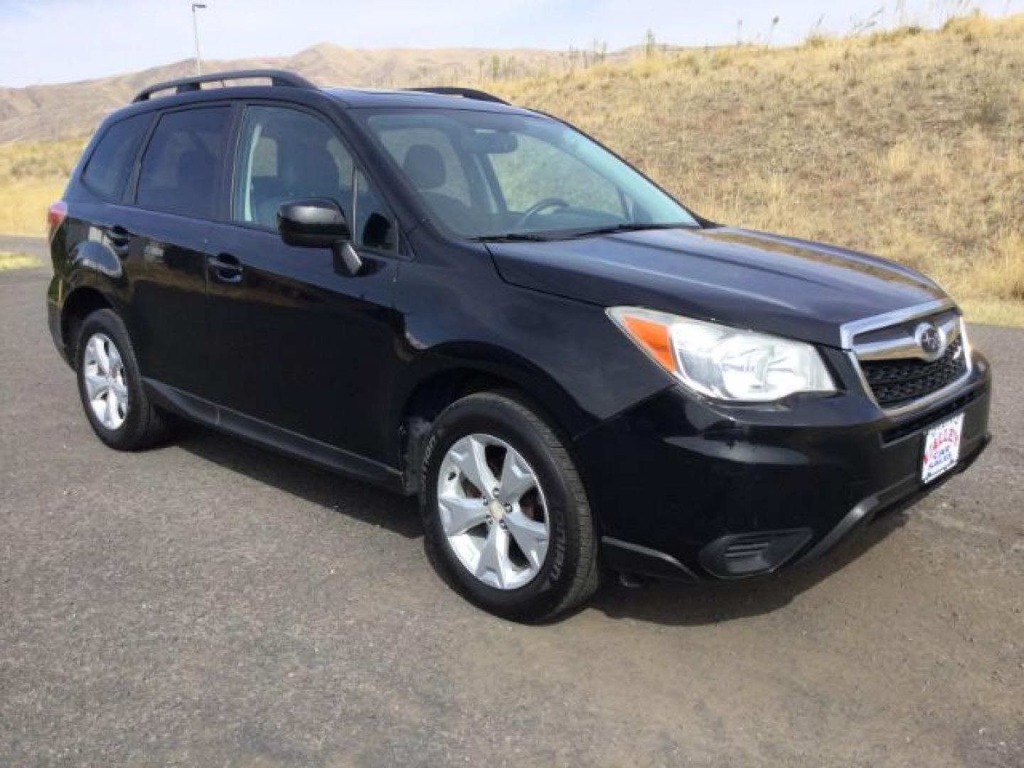 2015 Crystal Black Silica Subaru Forester 2.5i Premium (JF2SJADCXFH) with an 2.5L H-4 DOHC engine, located at 1801 Main Street, Lewiston, 83501, (208) 743-9371, 46.417065, -117.004799- Photo#1