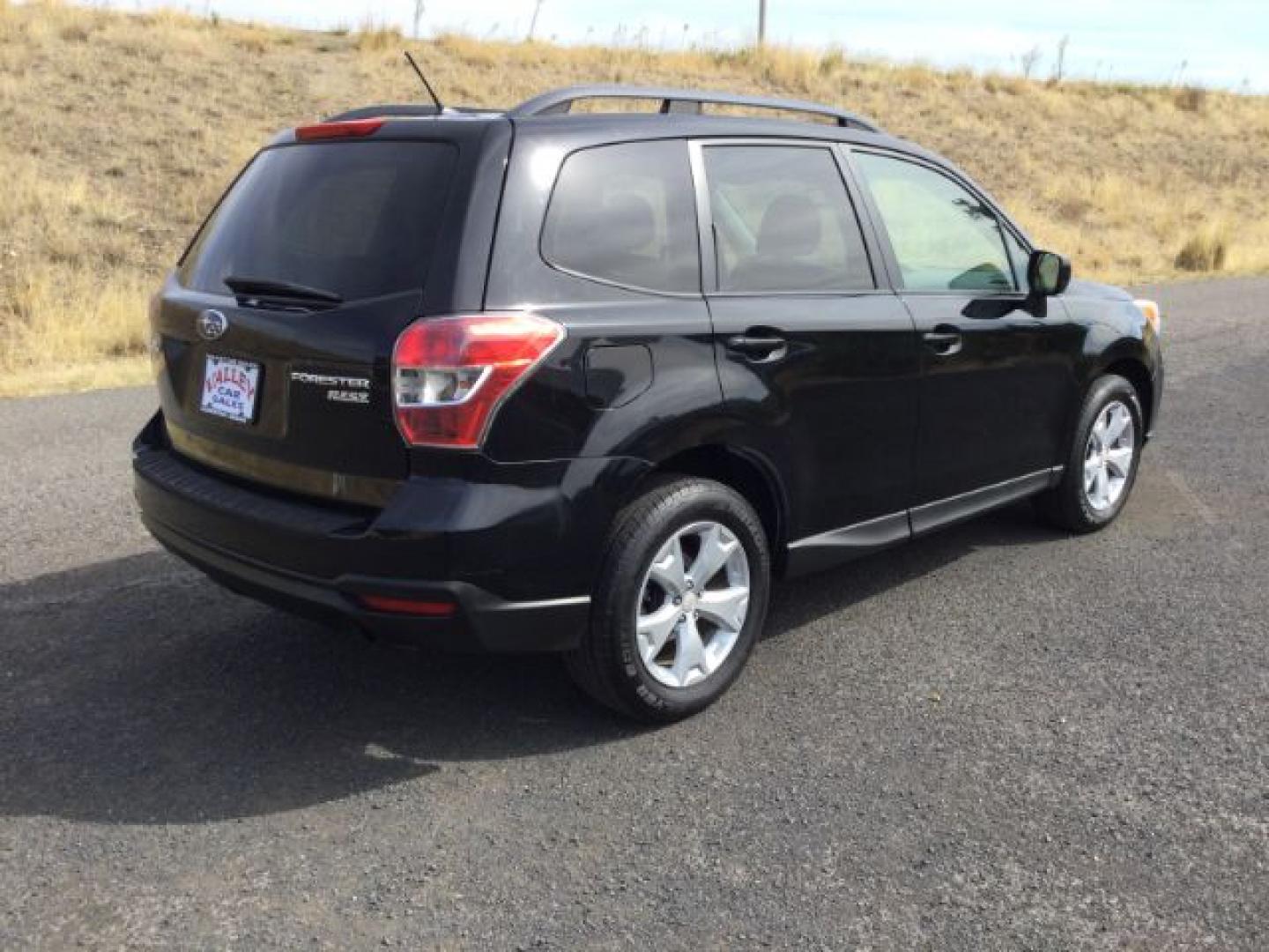 2015 Crystal Black Silica Subaru Forester 2.5i Premium (JF2SJADCXFH) with an 2.5L H-4 DOHC engine, located at 1801 Main Street, Lewiston, 83501, (208) 743-9371, 46.417065, -117.004799- Photo#9