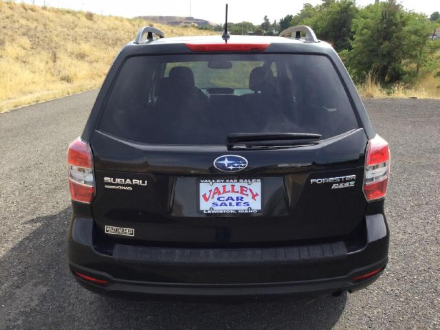 2015 Crystal Black Silica Subaru Forester 2.5i Premium (JF2SJADCXFH) with an 2.5L H-4 DOHC engine, located at 1801 Main Street, Lewiston, 83501, (208) 743-9371, 46.417065, -117.004799- Photo#13