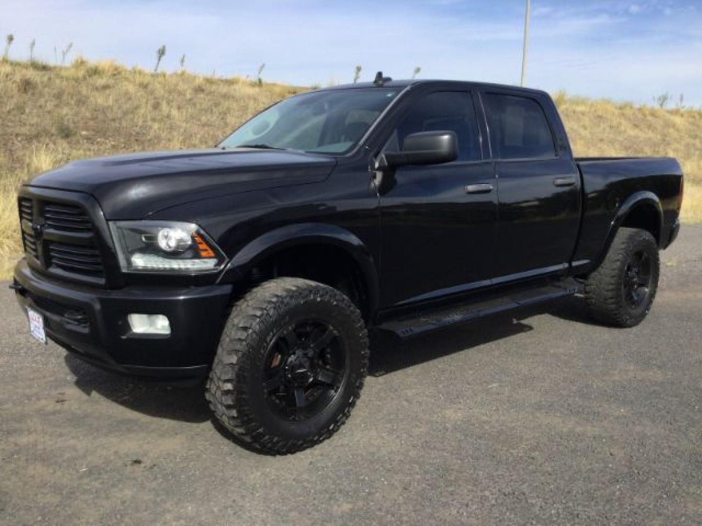 2014 Black Clearcoat /Diesel Gray/Black Ram 2500 Big Horn (3C6UR5DJ1EG) with an HEMI 6.4L V-8 VVT variable valve control engine, 6-Speed Automatic transmission, located at 1801 Main Street, Lewiston, 83501, (208) 743-9371, 46.417065, -117.004799- Photo#0