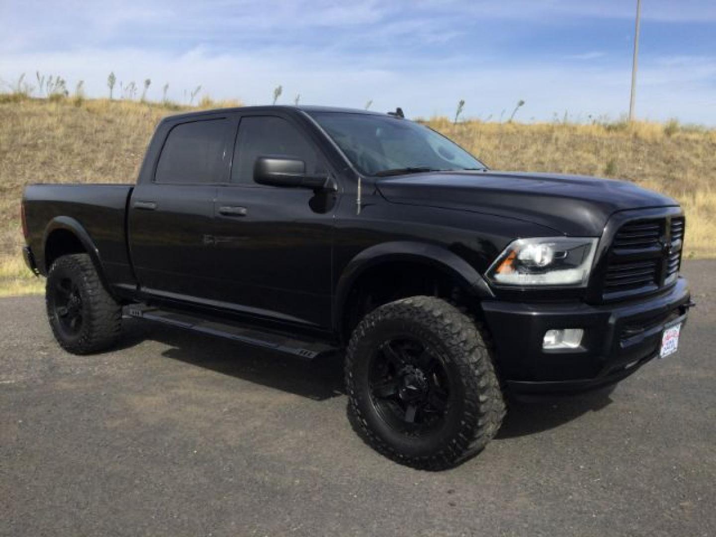 2014 Black Clearcoat /Diesel Gray/Black Ram 2500 Big Horn (3C6UR5DJ1EG) with an HEMI 6.4L V-8 VVT variable valve control engine, 6-Speed Automatic transmission, located at 1801 Main Street, Lewiston, 83501, (208) 743-9371, 46.417065, -117.004799- Photo#1