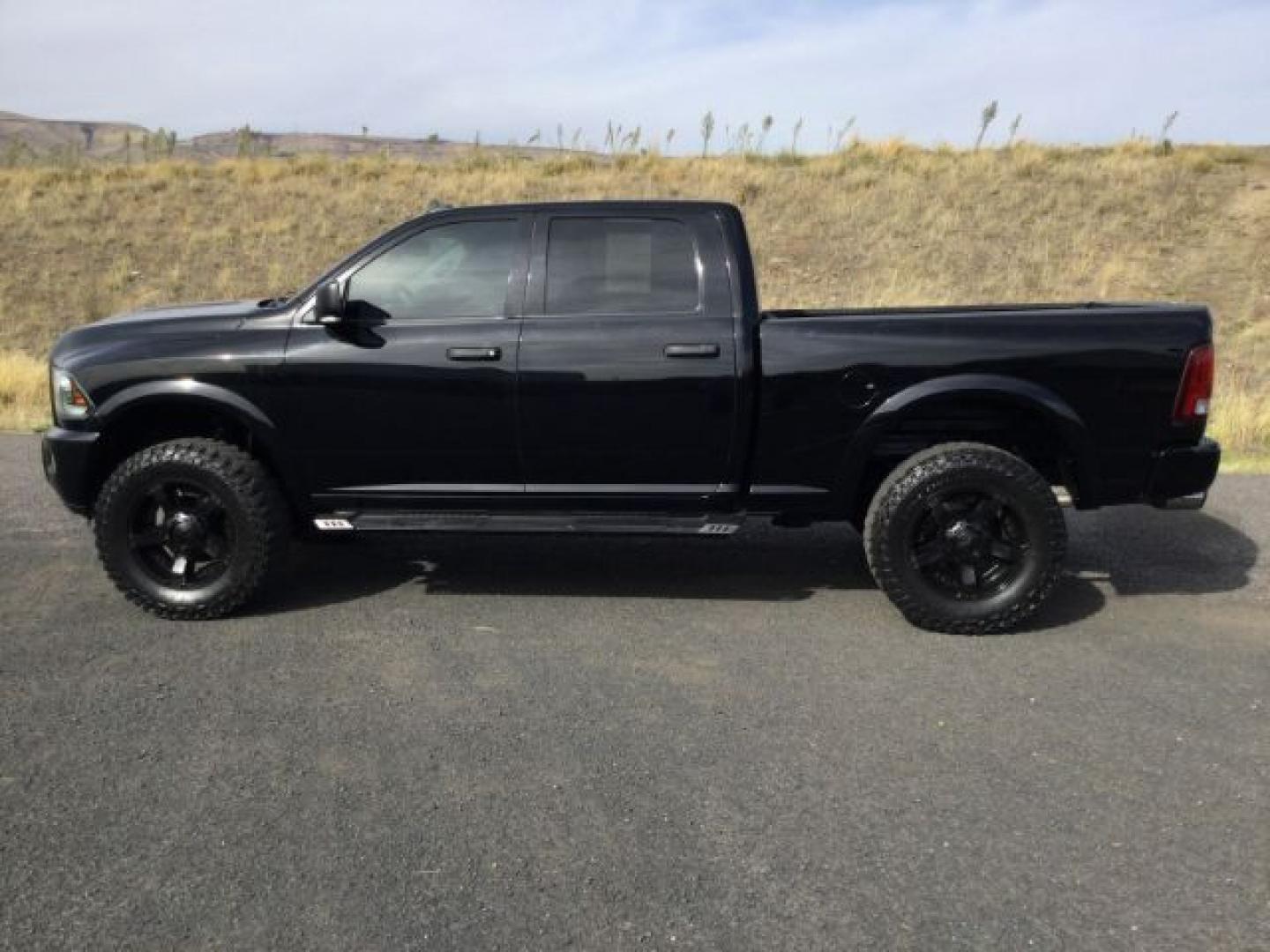 2014 Black Clearcoat /Diesel Gray/Black Ram 2500 Big Horn (3C6UR5DJ1EG) with an HEMI 6.4L V-8 VVT variable valve control engine, 6-Speed Automatic transmission, located at 1801 Main Street, Lewiston, 83501, (208) 743-9371, 46.417065, -117.004799- Photo#2