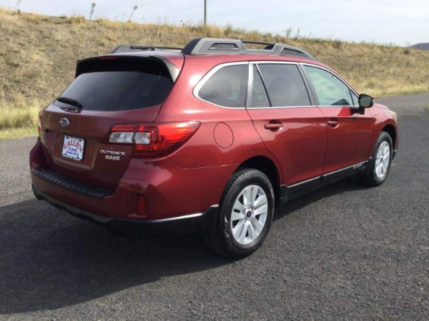 2015 Venetian Red Pearl /Slate Black Subaru Outback 2.5i Premium (4S4BSAHC4F3) with an 2.5L H-4 DOHC engine, Continuously Variable Transmission transmission, located at 1801 Main Street, Lewiston, 83501, (208) 743-9371, 46.417065, -117.004799- Photo#3
