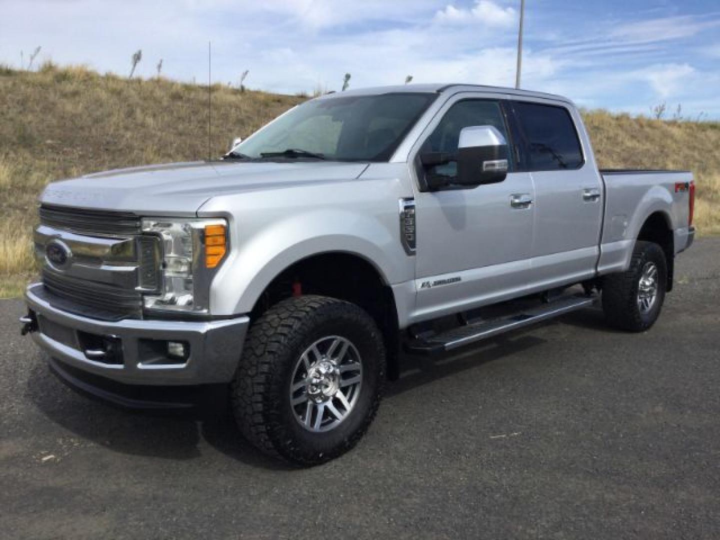 2017 Ingot Silver Metallic /Steel Gray Cloth Ford F-350 XLT FX4 (1FT8W3BT1HE) with an Powerstroke 6.7L V-8 direct injection engine, 6-Speed Automatic transmission, located at 1801 Main Street, Lewiston, 83501, (208) 743-9371, 46.417065, -117.004799- Photo#0