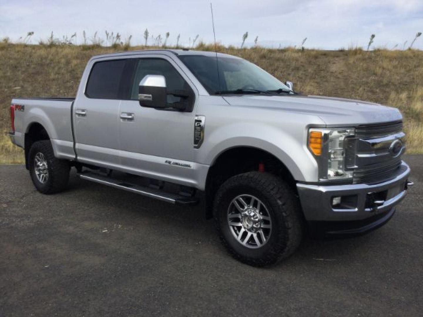2017 Ingot Silver Metallic /Steel Gray Cloth Ford F-350 XLT FX4 (1FT8W3BT1HE) with an Powerstroke 6.7L V-8 direct injection engine, 6-Speed Automatic transmission, located at 1801 Main Street, Lewiston, 83501, (208) 743-9371, 46.417065, -117.004799- Photo#1