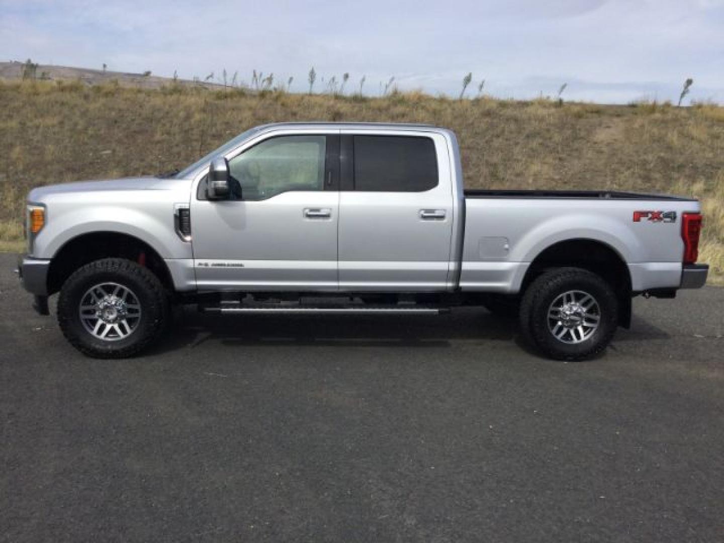 2017 Ingot Silver Metallic /Steel Gray Cloth Ford F-350 XLT FX4 (1FT8W3BT1HE) with an Powerstroke 6.7L V-8 direct injection engine, 6-Speed Automatic transmission, located at 1801 Main Street, Lewiston, 83501, (208) 743-9371, 46.417065, -117.004799- Photo#2