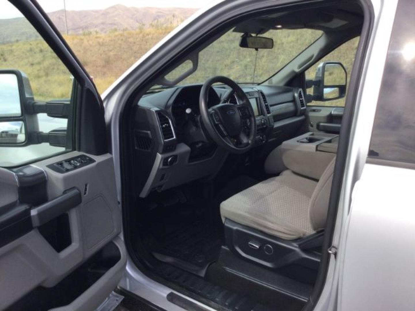 2017 Ingot Silver Metallic /Steel Gray Cloth Ford F-350 XLT FX4 (1FT8W3BT1HE) with an Powerstroke 6.7L V-8 direct injection engine, 6-Speed Automatic transmission, located at 1801 Main Street, Lewiston, 83501, (208) 743-9371, 46.417065, -117.004799- Photo#3