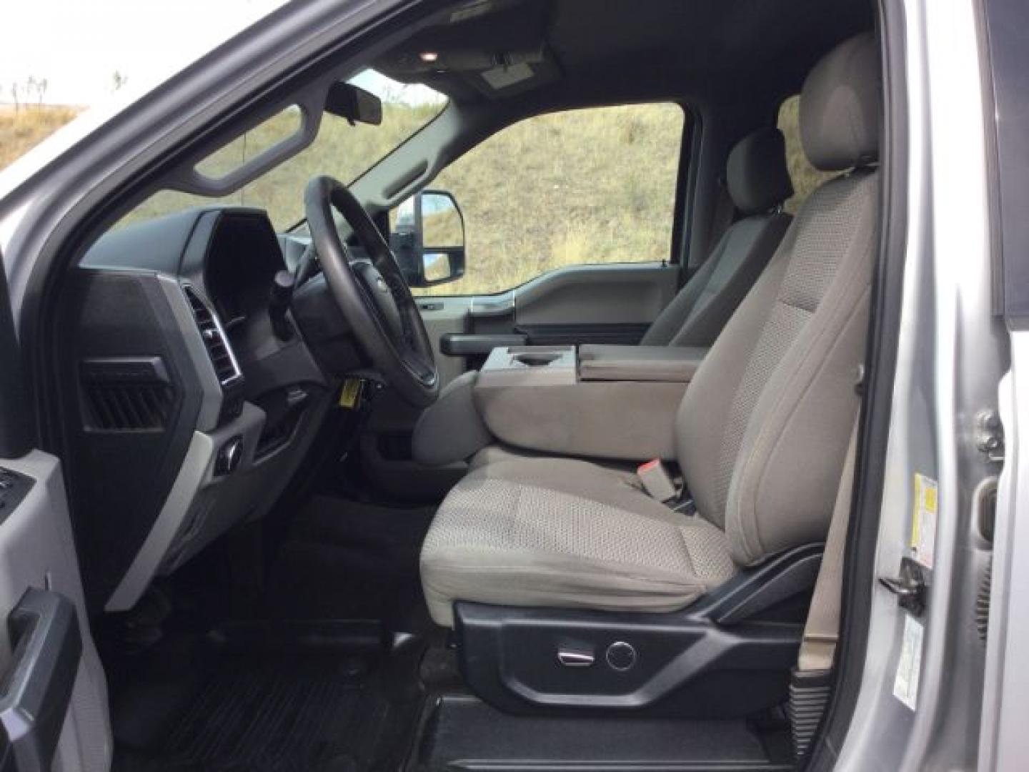 2017 Ingot Silver Metallic /Steel Gray Cloth Ford F-350 XLT FX4 (1FT8W3BT1HE) with an Powerstroke 6.7L V-8 direct injection engine, 6-Speed Automatic transmission, located at 1801 Main Street, Lewiston, 83501, (208) 743-9371, 46.417065, -117.004799- Photo#4