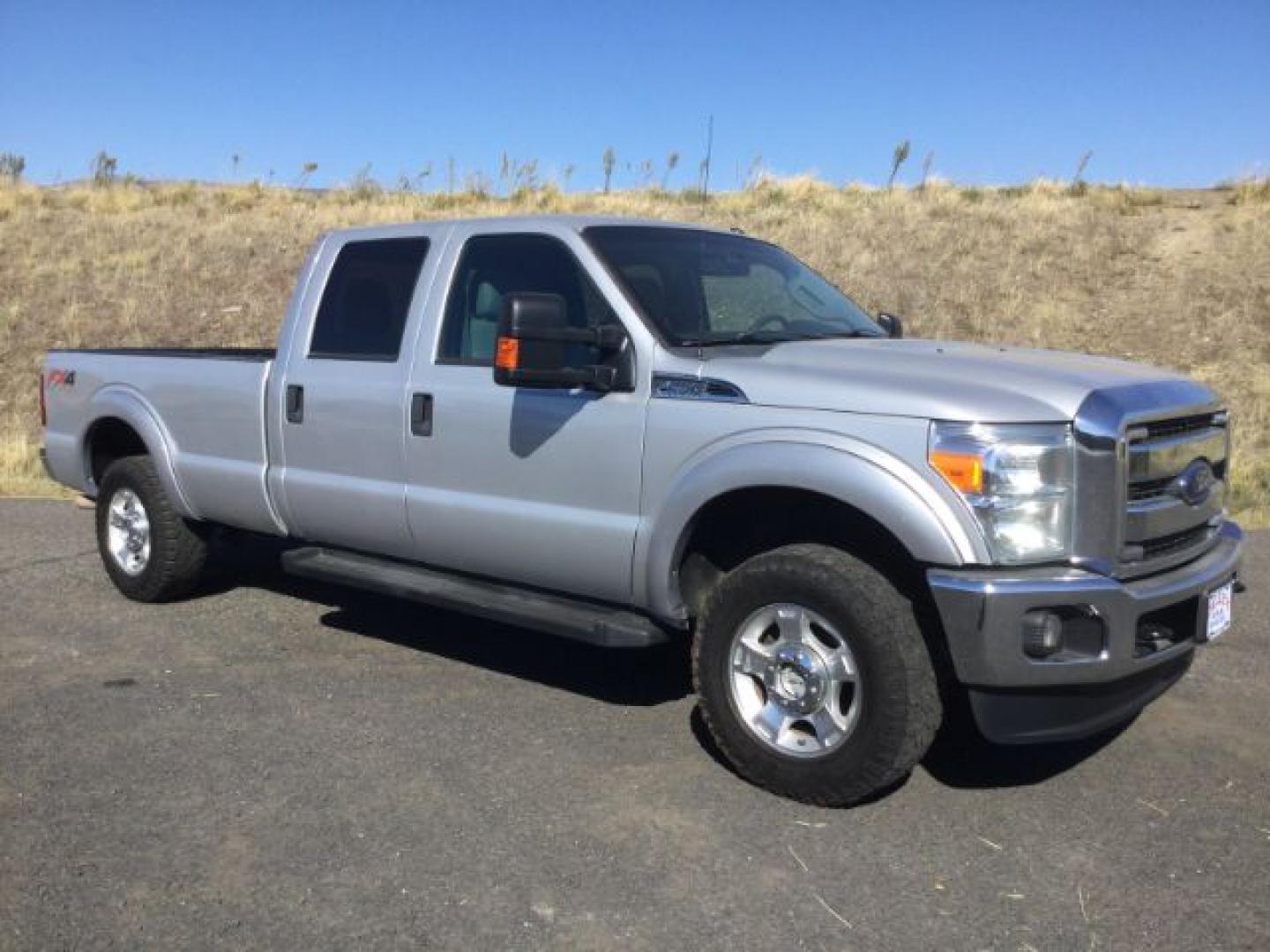 2015 Ingot Silver Metallic /Steel Gray Cloth Ford F-250 XLT (1FT7W2B65FE) with an 6.2 EFI V8 engine, 6-Speed Automatic transmission, located at 1801 Main Street, Lewiston, 83501, (208) 743-9371, 46.417065, -117.004799- Photo#0
