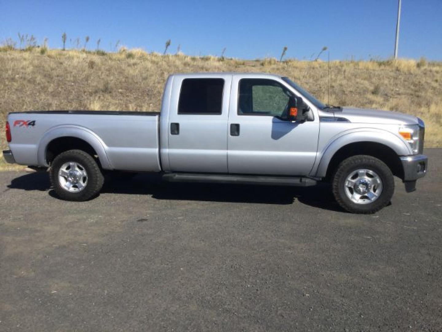 2015 Ingot Silver Metallic /Steel Gray Cloth Ford F-250 XLT (1FT7W2B65FE) with an 6.2 EFI V8 engine, 6-Speed Automatic transmission, located at 1801 Main Street, Lewiston, 83501, (208) 743-9371, 46.417065, -117.004799- Photo#12