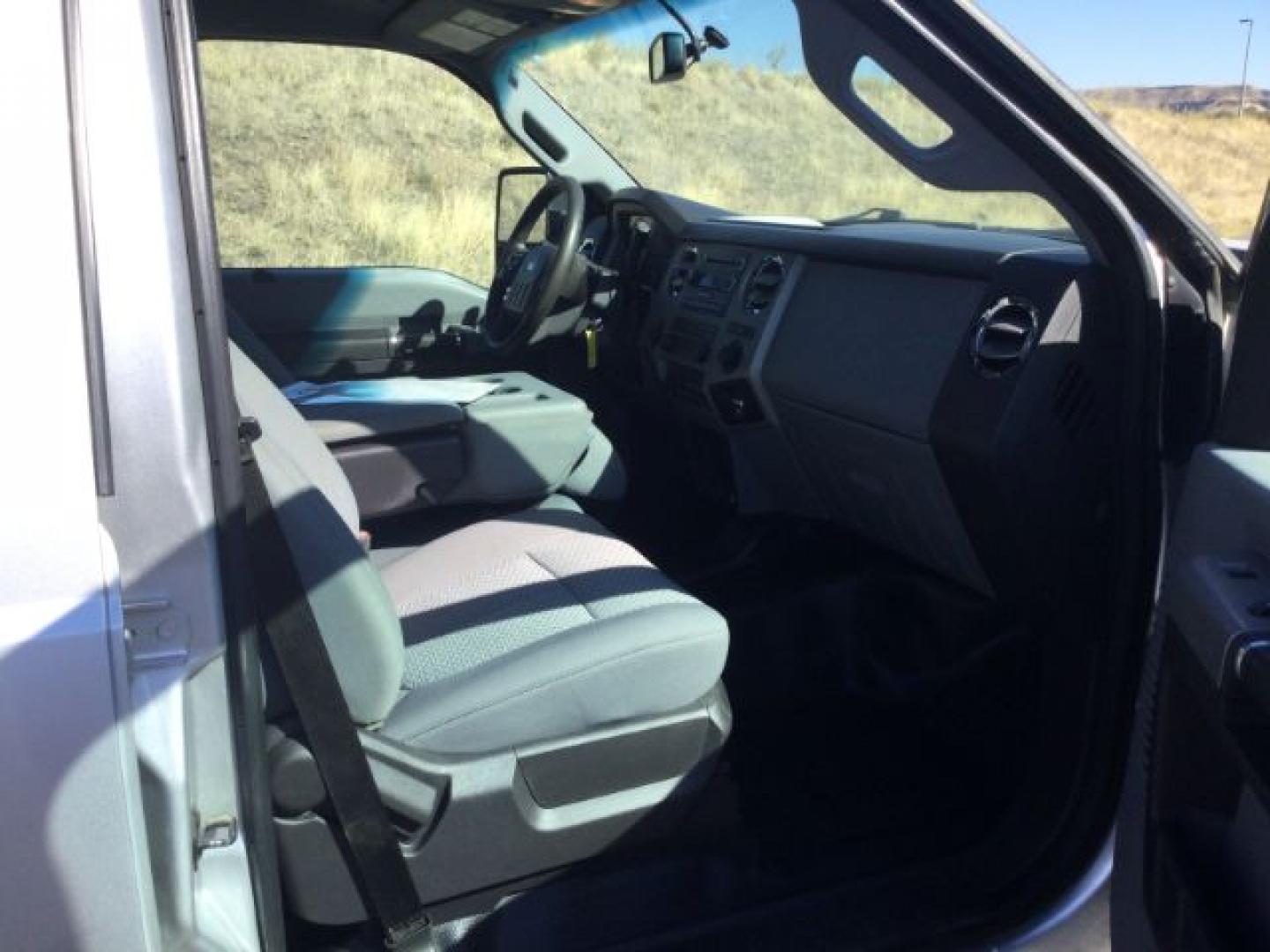 2015 Ingot Silver Metallic /Steel Gray Cloth Ford F-250 XLT (1FT7W2B65FE) with an 6.2 EFI V8 engine, 6-Speed Automatic transmission, located at 1801 Main Street, Lewiston, 83501, (208) 743-9371, 46.417065, -117.004799- Photo#15
