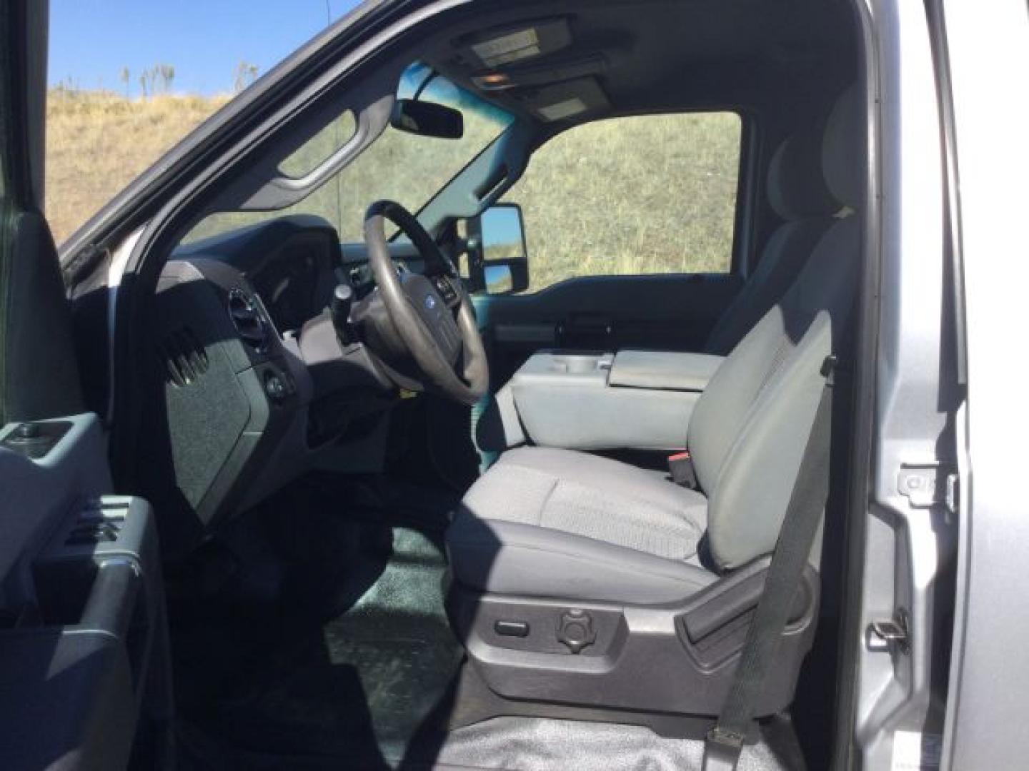 2015 Ingot Silver Metallic /Steel Gray Cloth Ford F-250 XLT (1FT7W2B65FE) with an 6.2 EFI V8 engine, 6-Speed Automatic transmission, located at 1801 Main Street, Lewiston, 83501, (208) 743-9371, 46.417065, -117.004799- Photo#20