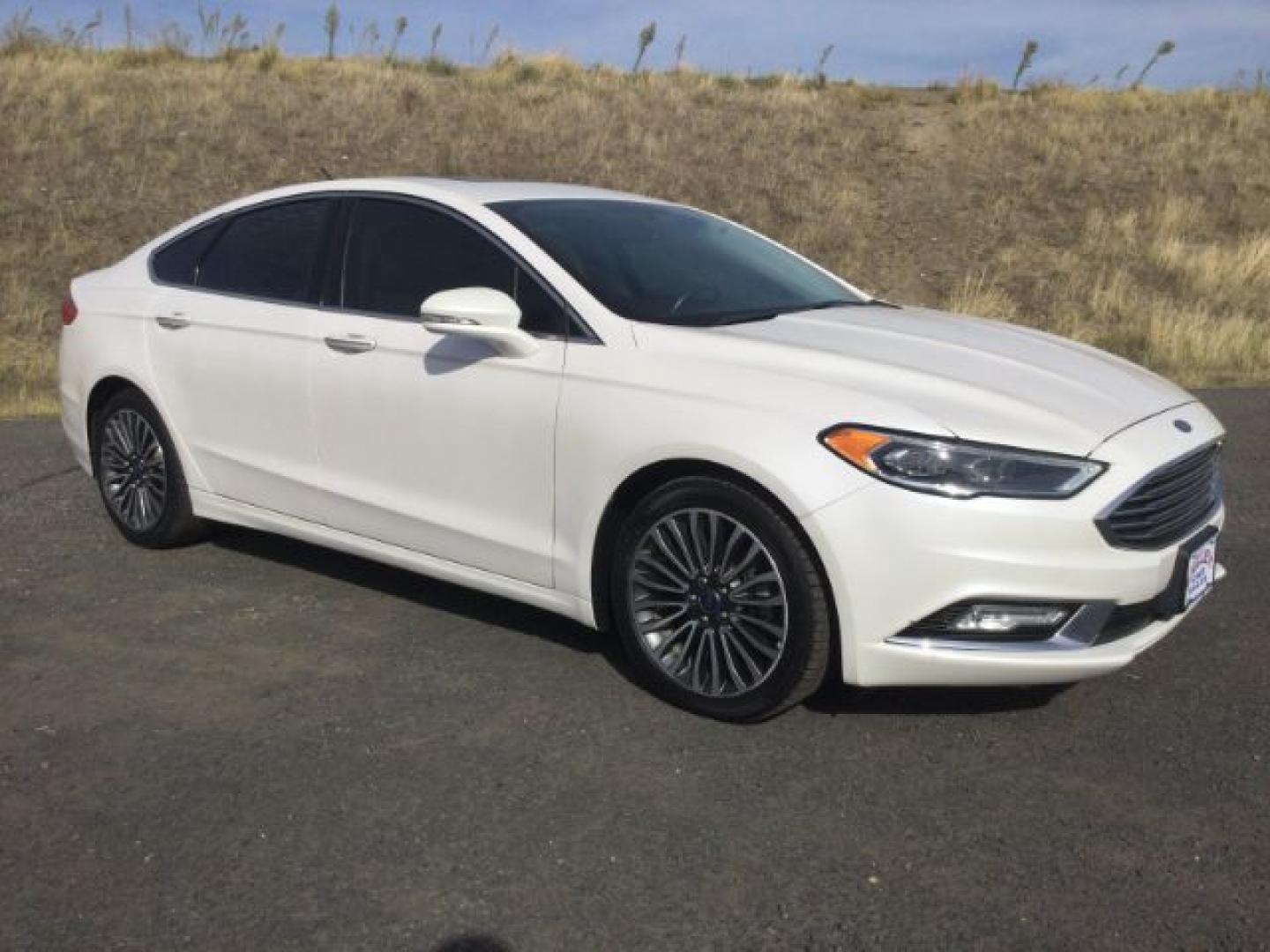2017 White Platinum Metallic Tri-Coat /Medium Soft Ceramic Ford Fusion Titanium | Platinum (3FA6P0K9XHR) with an EcoBoost 2L I-4 direct injection engine, Automatic transmission, located at 1801 Main Street, Lewiston, 83501, (208) 743-9371, 46.417065, -117.004799- Photo#0