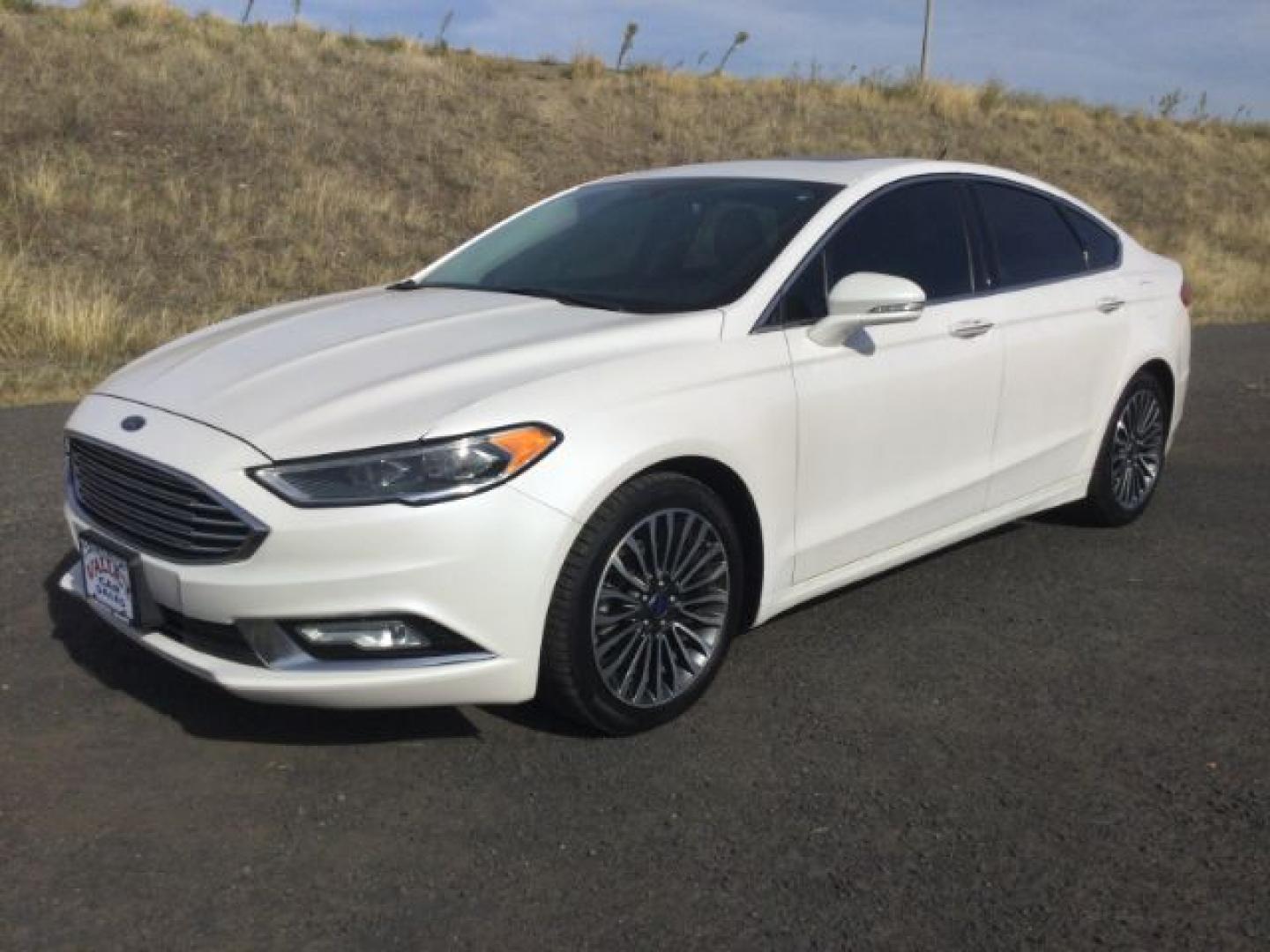 2017 White Platinum Metallic Tri-Coat /Medium Soft Ceramic Ford Fusion Titanium | Platinum (3FA6P0K9XHR) with an EcoBoost 2L I-4 direct injection engine, Automatic transmission, located at 1801 Main Street, Lewiston, 83501, (208) 743-9371, 46.417065, -117.004799- Photo#1