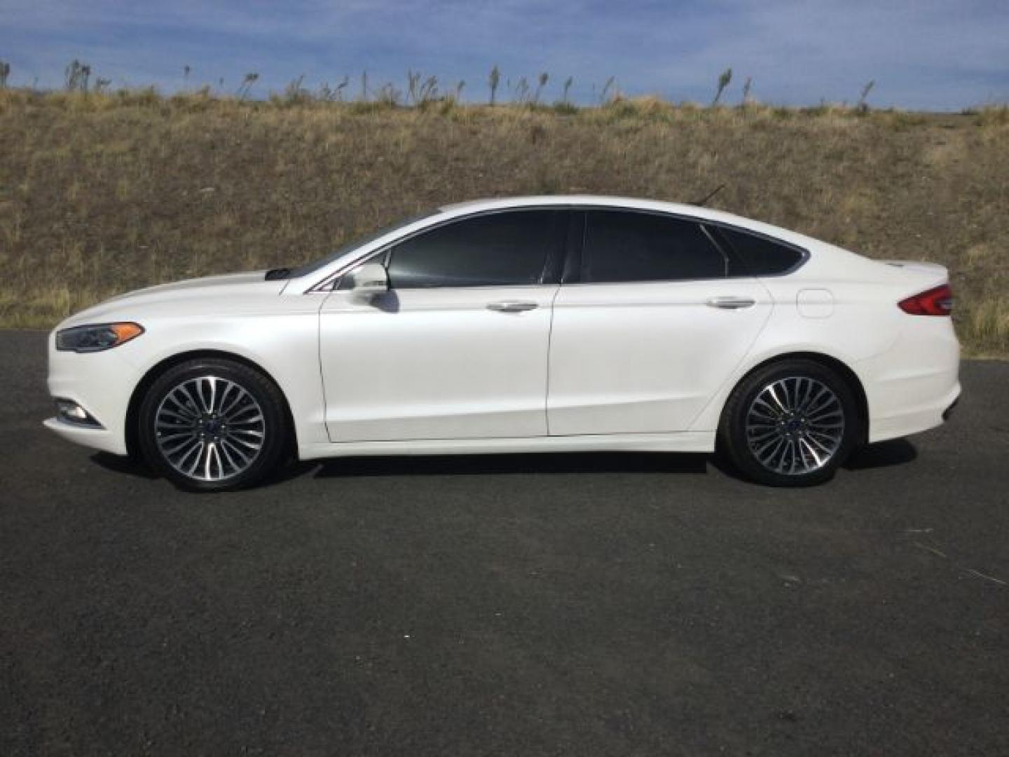 2017 White Platinum Metallic Tri-Coat /Medium Soft Ceramic Ford Fusion Titanium | Platinum (3FA6P0K9XHR) with an EcoBoost 2L I-4 direct injection engine, Automatic transmission, located at 1801 Main Street, Lewiston, 83501, (208) 743-9371, 46.417065, -117.004799- Photo#2