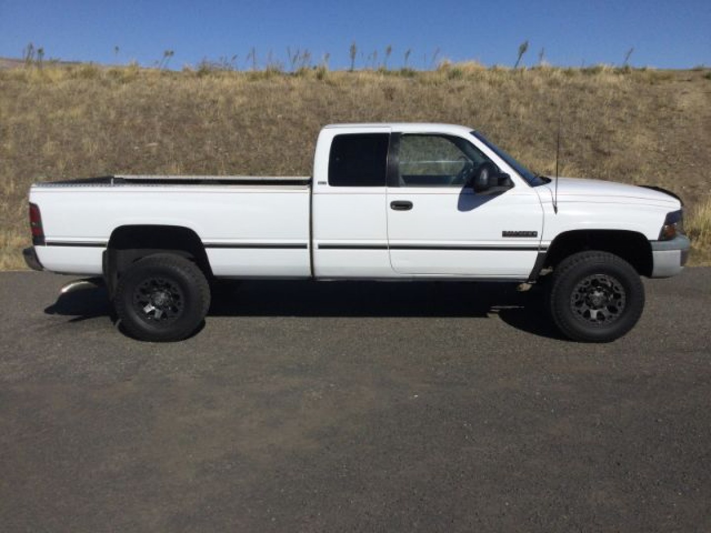 1997 Bright White /Mist Gray Dodge Ram 2500 SLT Laramie (3B7KF23D9VG) with an Cummins 5.9L I-6 diesel direct injection engine, Automatic transmission, located at 1801 Main Street, Lewiston, 83501, (208) 743-9371, 46.417065, -117.004799- Photo#1