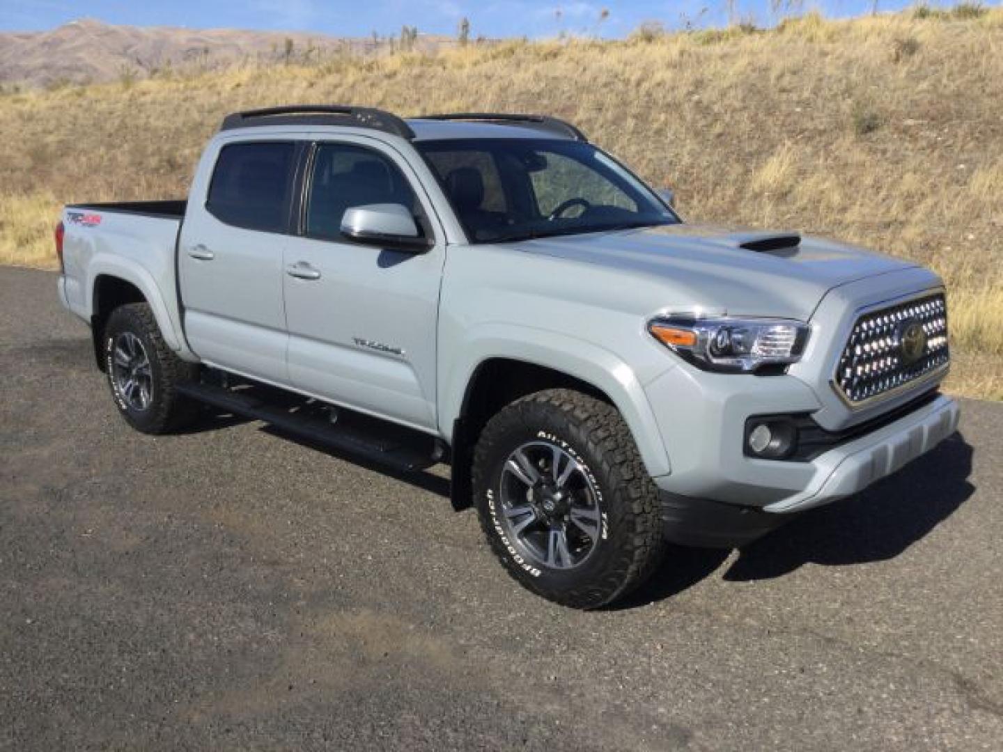 2019 Cement Gray Metallic /Black Leather Toyota Tacoma TRD Sport (5TFCZ5AN5KX) with an 3.5L V-6 port/direct injection engine, 6 Speed Manual transmission, located at 1801 Main Street, Lewiston, 83501, (208) 743-9371, 46.417065, -117.004799- Photo#1