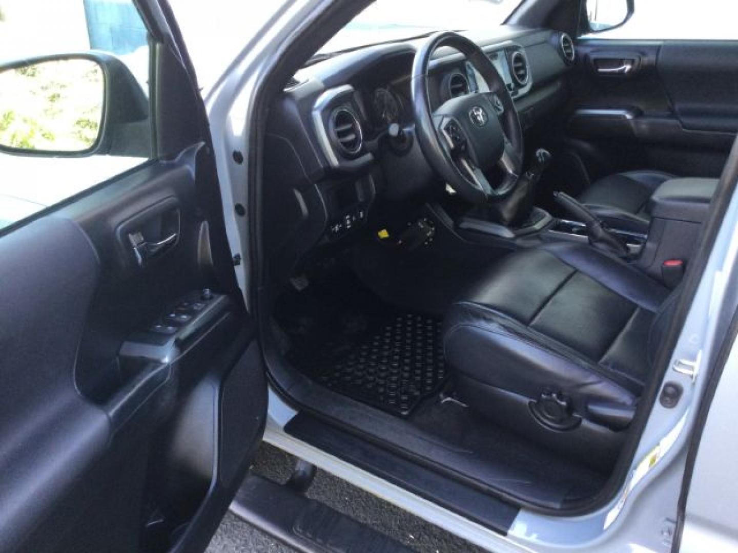 2019 Cement Gray Metallic /Black Leather Toyota Tacoma TRD Sport (5TFCZ5AN5KX) with an 3.5L V-6 port/direct injection engine, 6 Speed Manual transmission, located at 1801 Main Street, Lewiston, 83501, (208) 743-9371, 46.417065, -117.004799- Photo#3