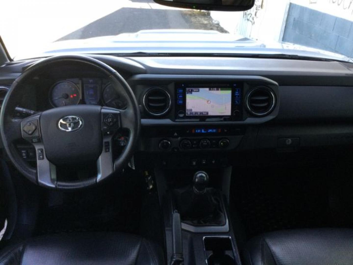 2019 Cement Gray Metallic /Black Leather Toyota Tacoma TRD Sport (5TFCZ5AN5KX) with an 3.5L V-6 port/direct injection engine, 6 Speed Manual transmission, located at 1801 Main Street, Lewiston, 83501, (208) 743-9371, 46.417065, -117.004799- Photo#9