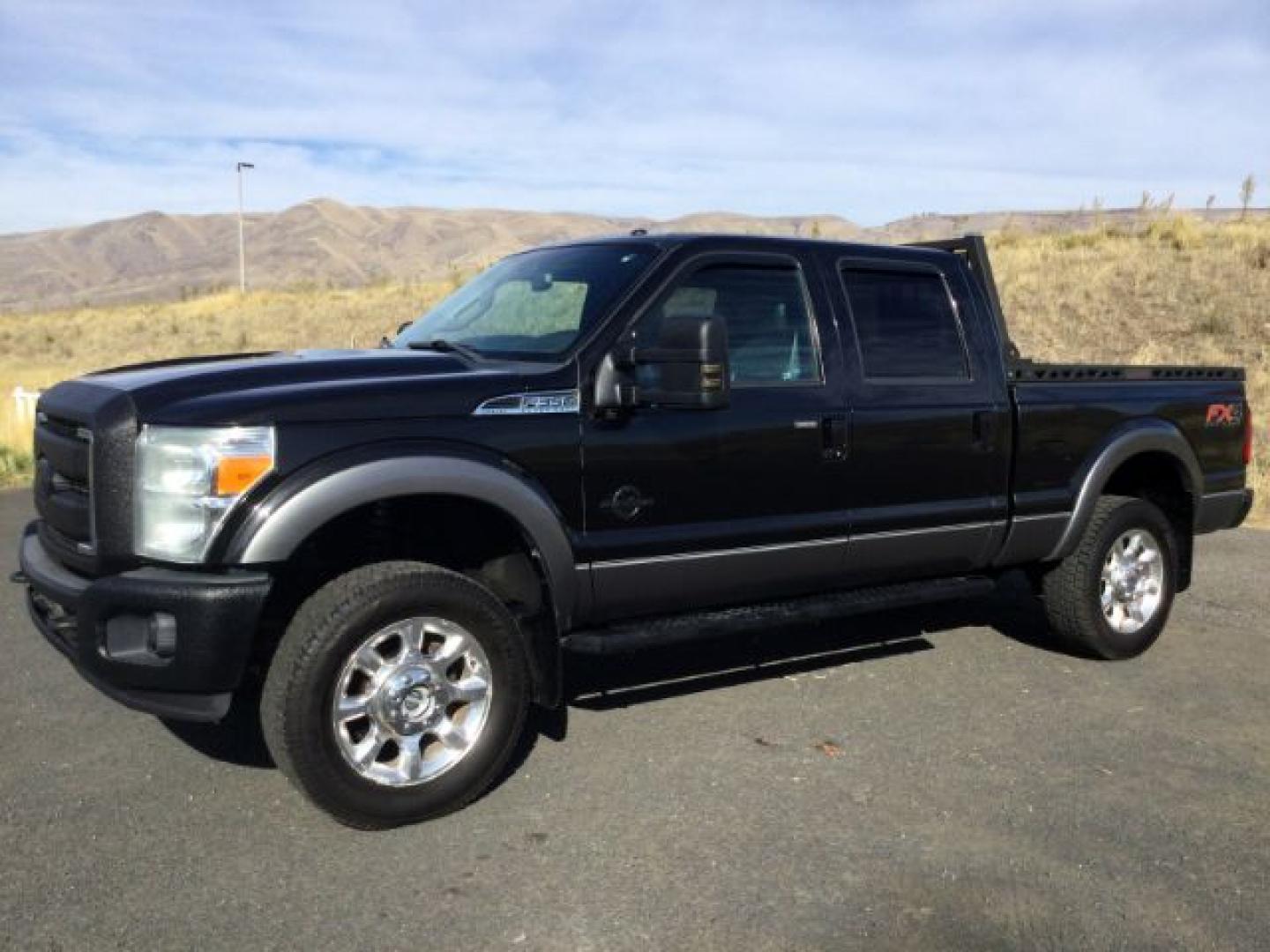 2013 Tuxedo Black Metallic /Black Ford F-350 LARIAT (1FT8W3BT3DE) with an Powerstroke 6.7L V-8 xxxxxx engine, 6-Speed Automatic transmission, located at 1801 Main Street, Lewiston, 83501, (208) 743-9371, 46.417065, -117.004799- Photo#0