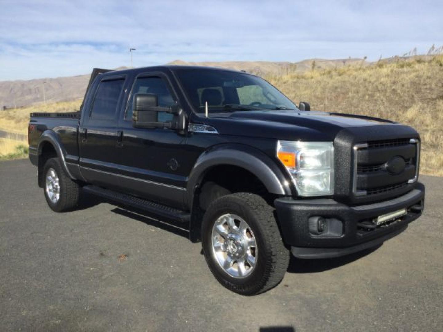 2013 Tuxedo Black Metallic /Black Ford F-350 LARIAT (1FT8W3BT3DE) with an Powerstroke 6.7L V-8 xxxxxx engine, 6-Speed Automatic transmission, located at 1801 Main Street, Lewiston, 83501, (208) 743-9371, 46.417065, -117.004799- Photo#1