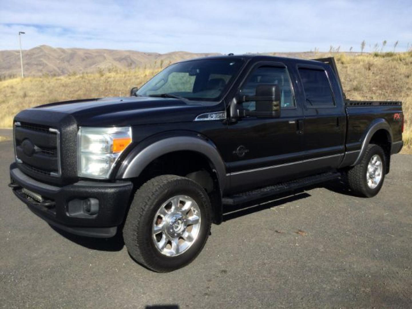 2013 Tuxedo Black Metallic /Black Ford F-350 LARIAT (1FT8W3BT3DE) with an Powerstroke 6.7L V-8 xxxxxx engine, 6-Speed Automatic transmission, located at 1801 Main Street, Lewiston, 83501, (208) 743-9371, 46.417065, -117.004799- Photo#3