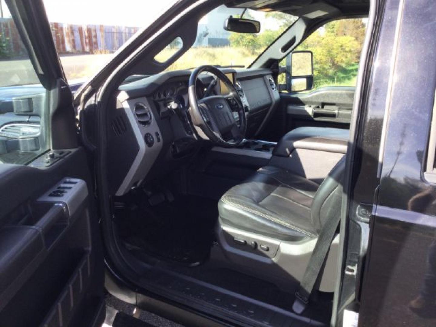 2013 Tuxedo Black Metallic /Black Ford F-350 LARIAT (1FT8W3BT3DE) with an Powerstroke 6.7L V-8 xxxxxx engine, 6-Speed Automatic transmission, located at 1801 Main Street, Lewiston, 83501, (208) 743-9371, 46.417065, -117.004799- Photo#4