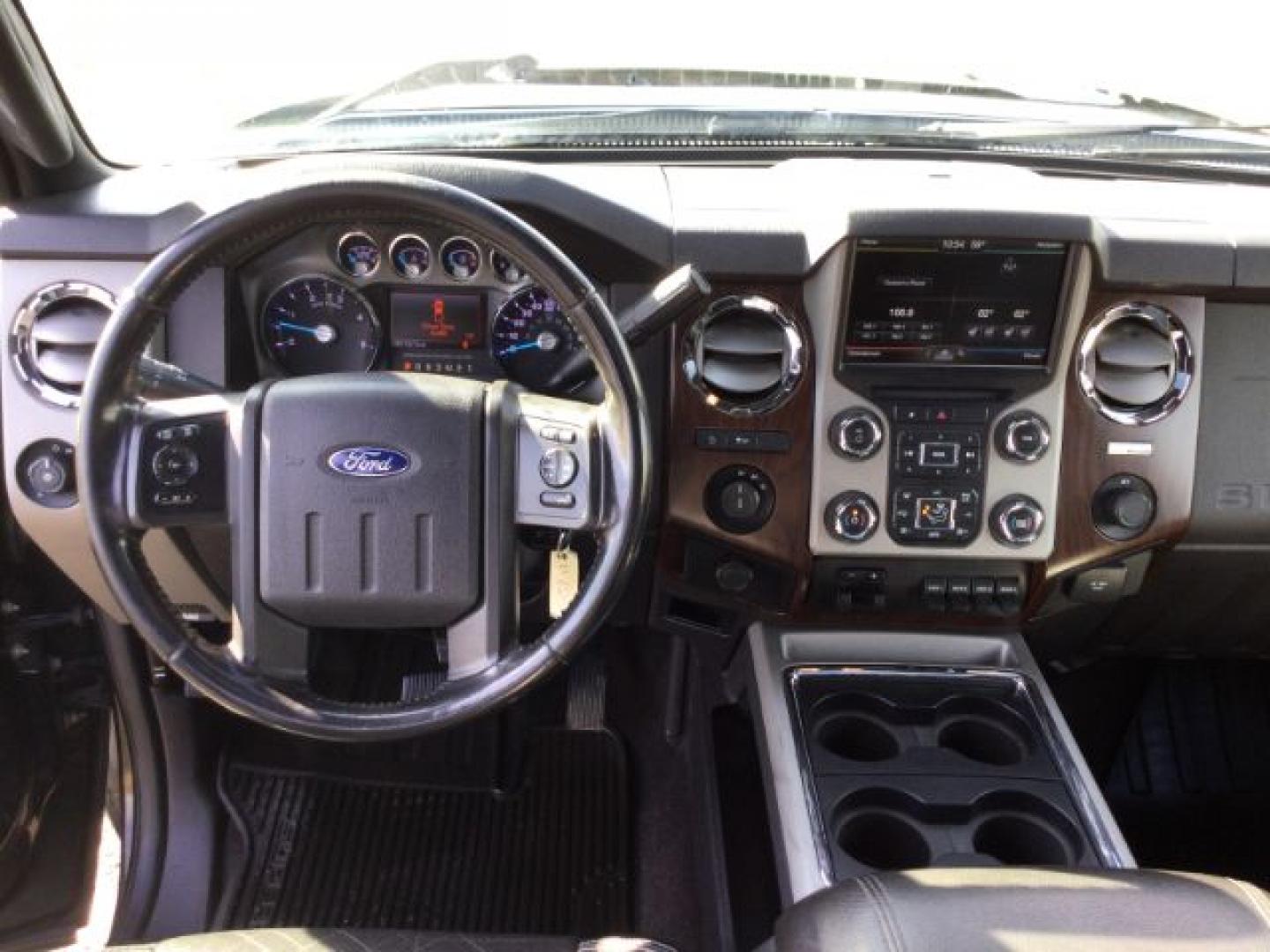2013 Tuxedo Black Metallic /Black Ford F-350 LARIAT (1FT8W3BT3DE) with an Powerstroke 6.7L V-8 xxxxxx engine, 6-Speed Automatic transmission, located at 1801 Main Street, Lewiston, 83501, (208) 743-9371, 46.417065, -117.004799- Photo#6