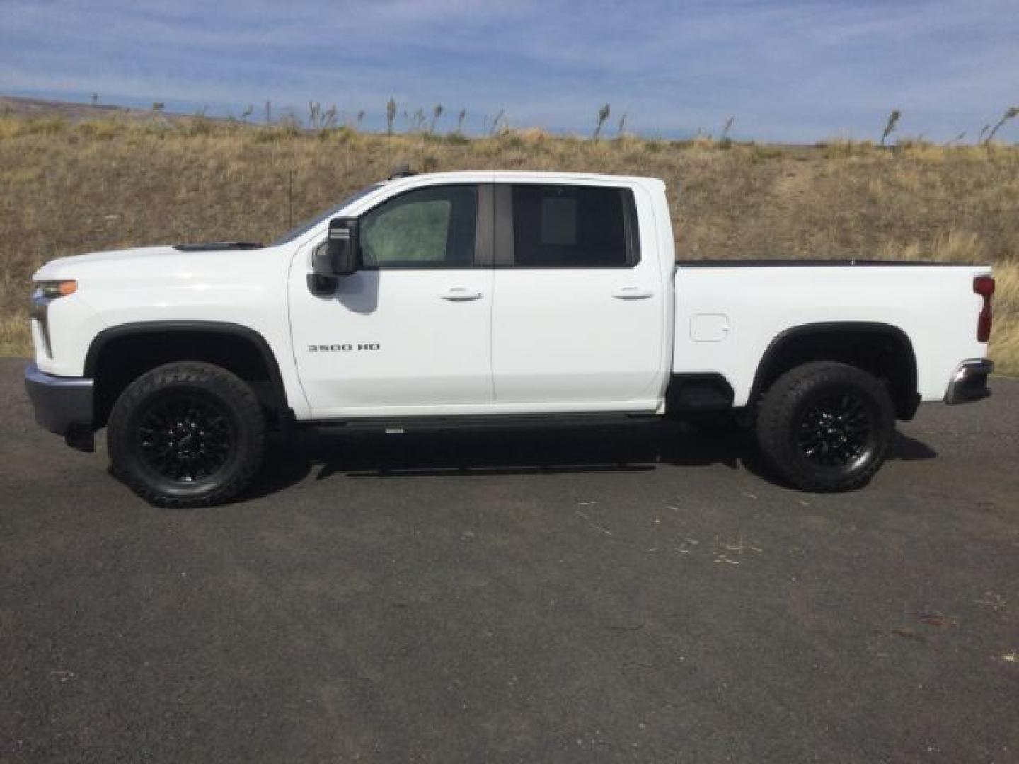 2023 Summit White /Jet Black Chevrolet Silverado 3500HD LT (1GC4YTEY4PF) with an Duramax 6.6L V-8 direct injection engine, 10-speed automatic transmission, located at 1801 Main Street, Lewiston, 83501, (208) 743-9371, 46.417065, -117.004799- Photo#1