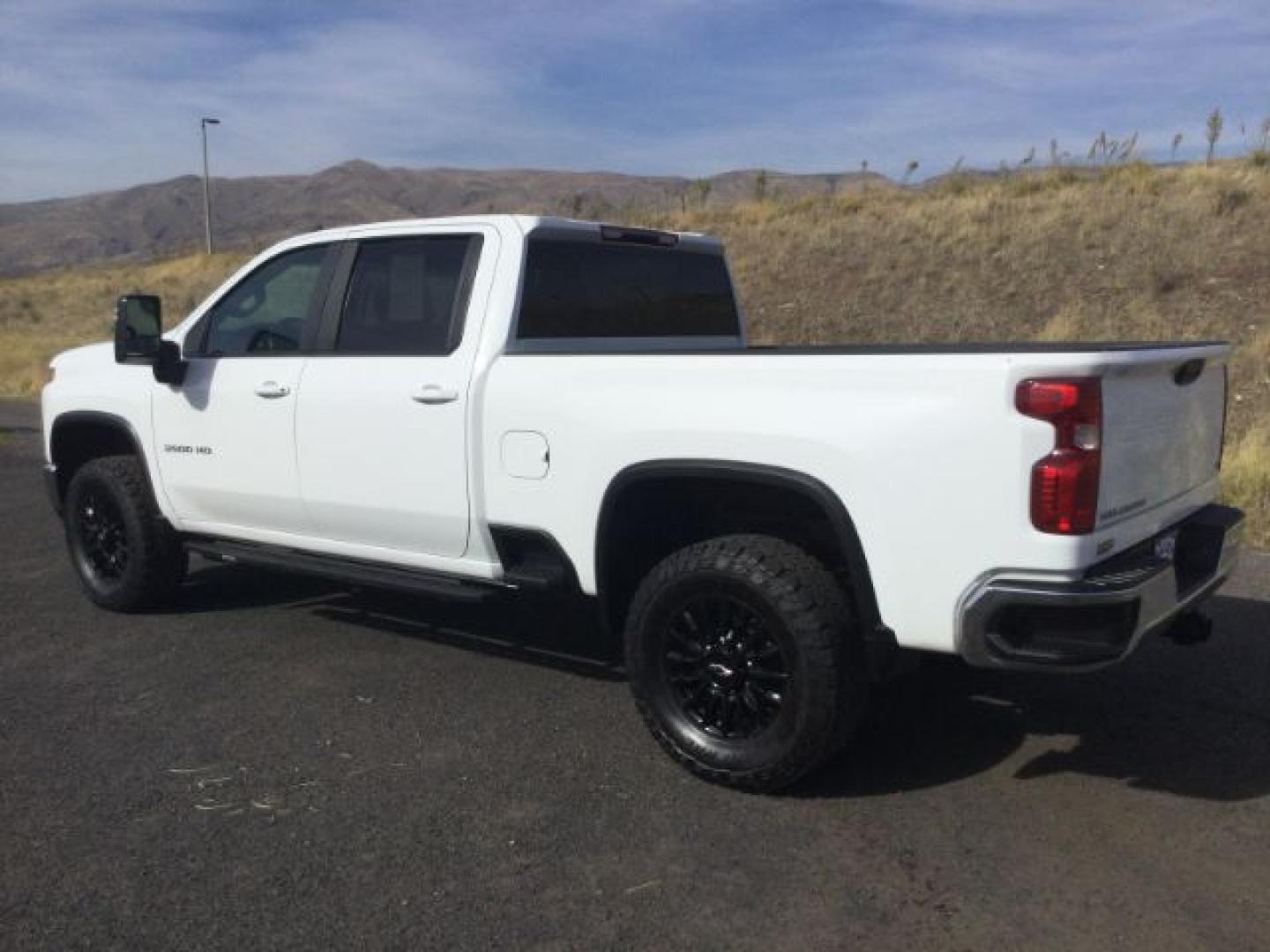 2023 Summit White /Jet Black Chevrolet Silverado 3500HD LT (1GC4YTEY4PF) with an Duramax 6.6L V-8 direct injection engine, 10-speed automatic transmission, located at 1801 Main Street, Lewiston, 83501, (208) 743-9371, 46.417065, -117.004799- Photo#2
